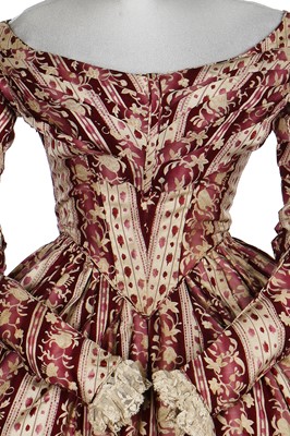 Lot 38 - A magenta-striped cotton day dress, late 1830s-early 1840s
