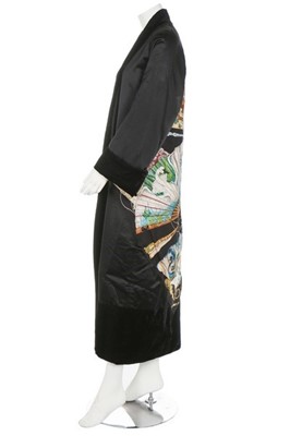 Lot 148 - An Hermès black satin evening coat/robe, 1990s,...