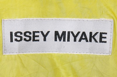 Lot 280 - An Issey Miyake fantasy-print dress and coat, circa 1995