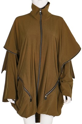 Lot 279 - An Issey Miyake ensemble, comprising: green-grey nylon crêpe coat, Spring-Summer 1991