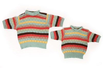 Lot 171 - A pair of matching knitted sweaters worn by...
