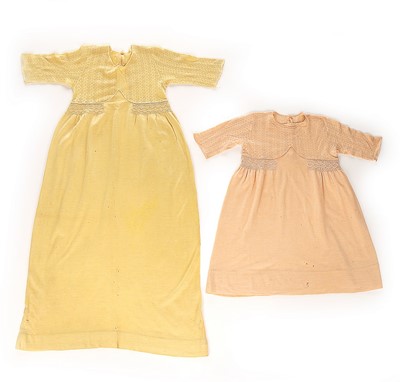 Lot 172 - A pair of knitted wool nightdresses, belonging...