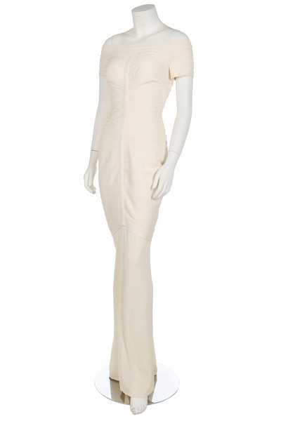 Lot 185 - An Hervé Léger ivory bandage evening gown,...