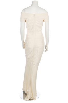 Lot 185 - An Hervé Léger ivory bandage evening gown,...