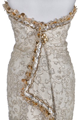 Lot 121 - A fine Balenciaga couture gold cloqué sheath, 1965