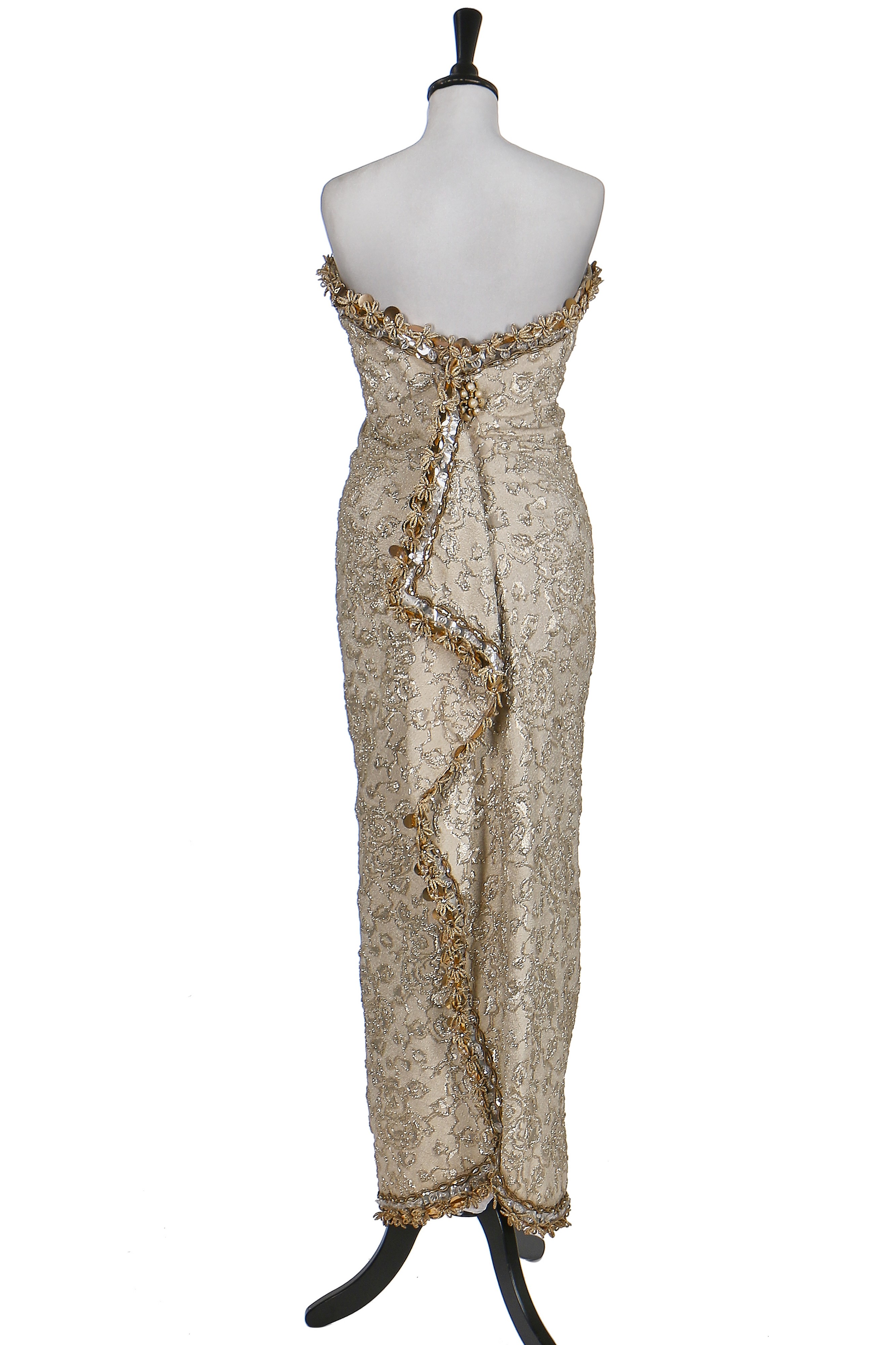 Lot 121 - A fine Balenciaga couture gold cloqué sheath,