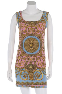 Lot 317 - A Gianni Versace printed denim mini dress,...