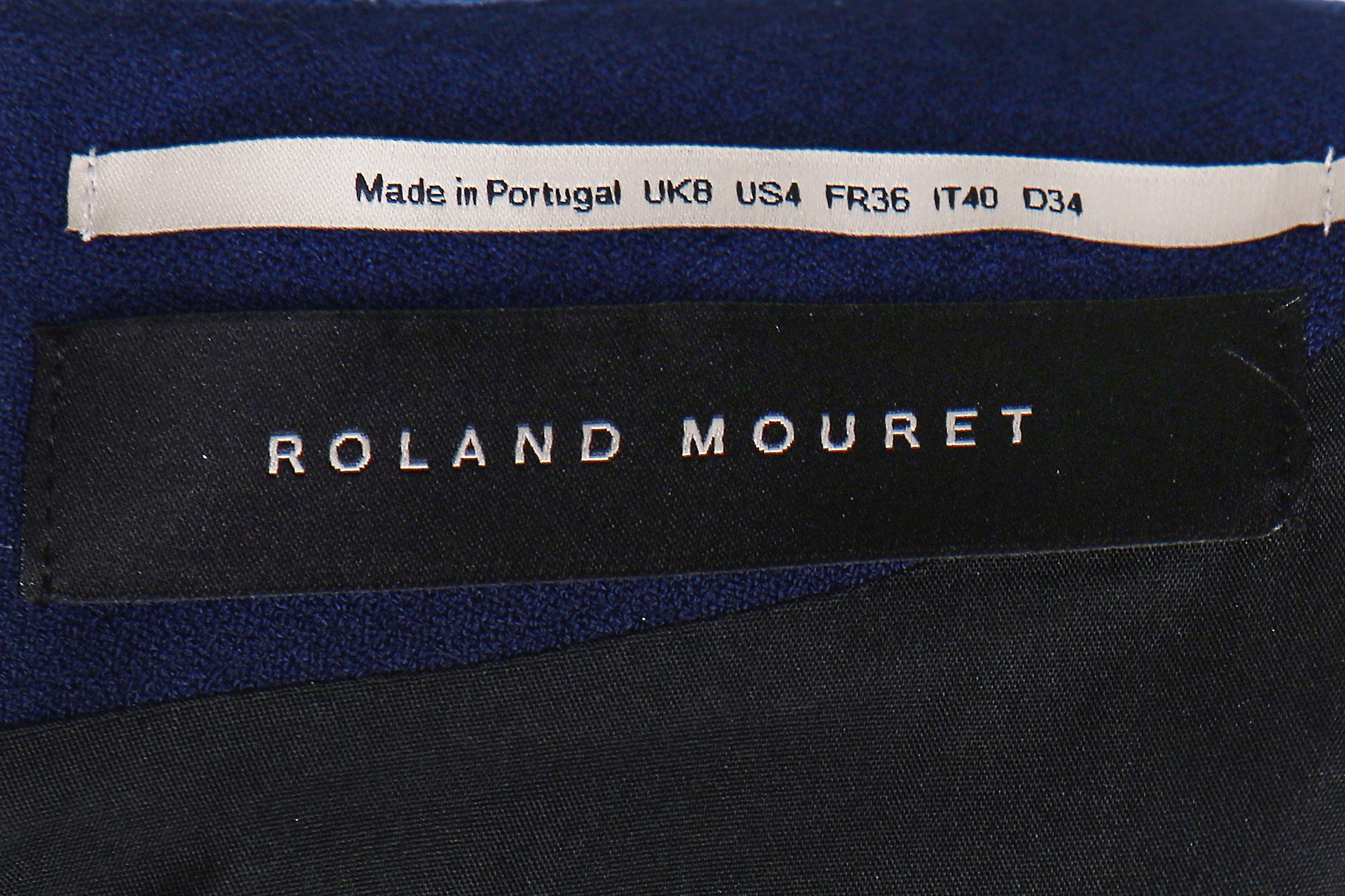 Lot 207 - Four Roland Mouret navy-blue dresses, modern,