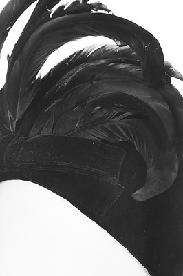 Lot 119 - A Balenciaga black velvet evening hat with cockerel cockade, circa 1965
