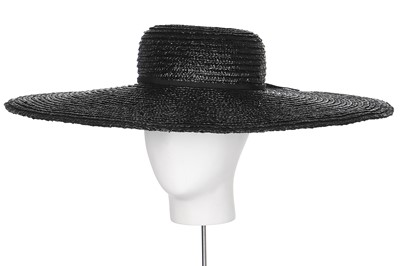 Lot 128 - A Balenciaga navy straw picture hat, 1967