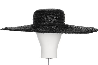 Lot 128 - A Balenciaga navy straw picture hat, 1967