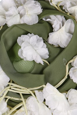 Lot 256 - A Christian Dior hat covered in white blooms, circa 1960