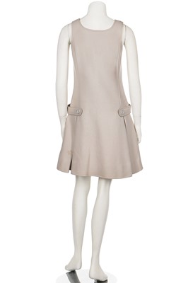 Lot 129 - A Courrèges white satinised cotton dress, circa 1970