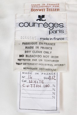 Lot 129 - A Courrèges white satinised cotton dress, circa 1970