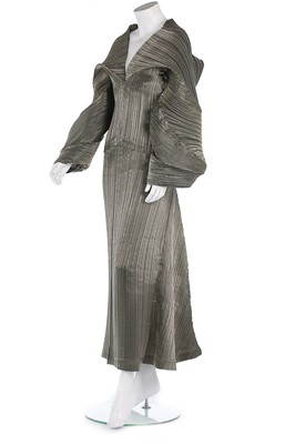 Lot 356 - An Issey Miyake pleated gold polyester...