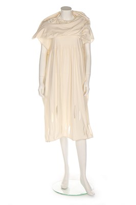 Lot 359 - A Comme des Garçons cream cotton jersey dress,...