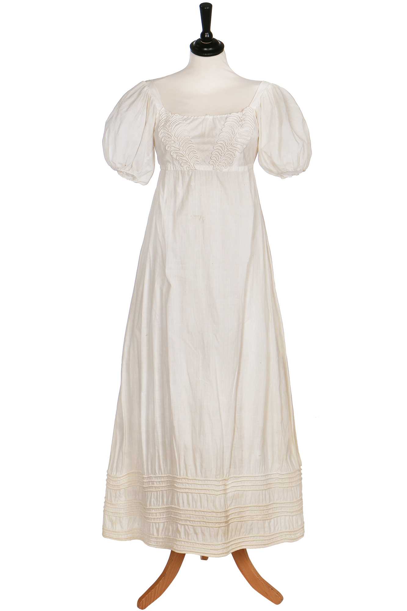 Lot 378 - A white cotton dress, circa 1825,