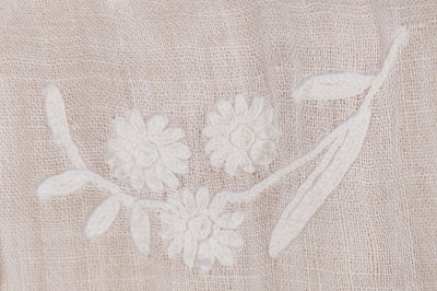 Lot 379 - An embroidered muslin dress circa 1810