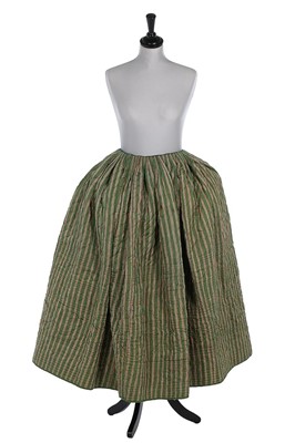 Lot 76 - A striped and quilted silk petticoat, French,...