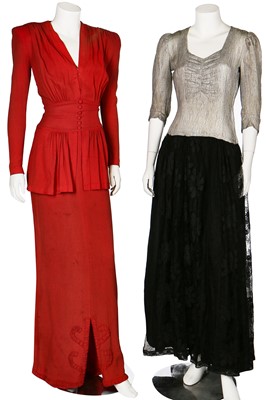 Lot 71 - A black crêpe evening-gown with studded red and purple angular insertions to shoulders, mid 1940s