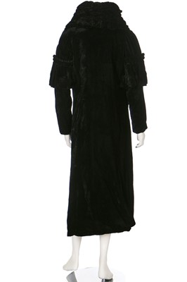 Lot 30 - A black velvet evening coat with Chinese embroidered skirt panel to lining, 1930