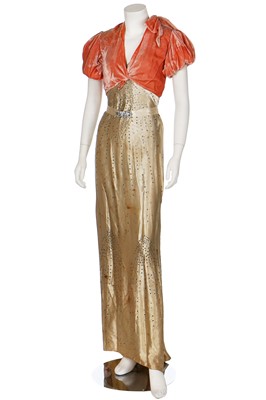 Lot 39 - Four evening gowns in shades of peach and silver, 1930s