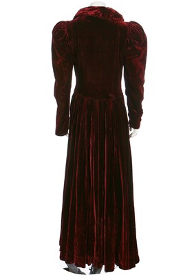 Lot 43 - A bordeaux velvet evening coat with leg-o-mutton sleeves, 1930s