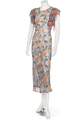 Lot 55 - A good bias-cut floral printed chiffon garden-party gown with matching bolero, 1930s