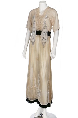 Lot 345 - A whiteworked and beaded muslin dress, circa 1913