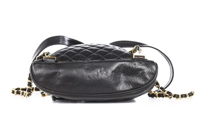 Lot 2 - A Chanel quilted black leather backpack, circa...