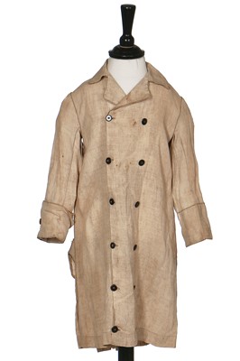 Lot 283 - A child's miniature linen duster coat, 1870s