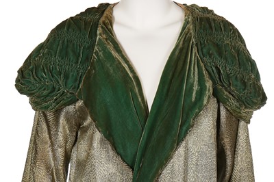 Lot 13 - A lamé opera coat with ruched green velvet collar, 1920s
