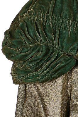 Lot 13 - A lamé opera coat with ruched green velvet collar, 1920s
