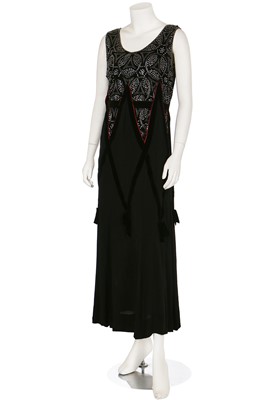 Lot 6 - A black silk evening gown with rhinestone-studded velvet bodice, circa 1929