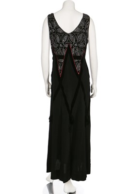 Lot 6 - A black silk evening gown with rhinestone-studded velvet bodice, circa 1929