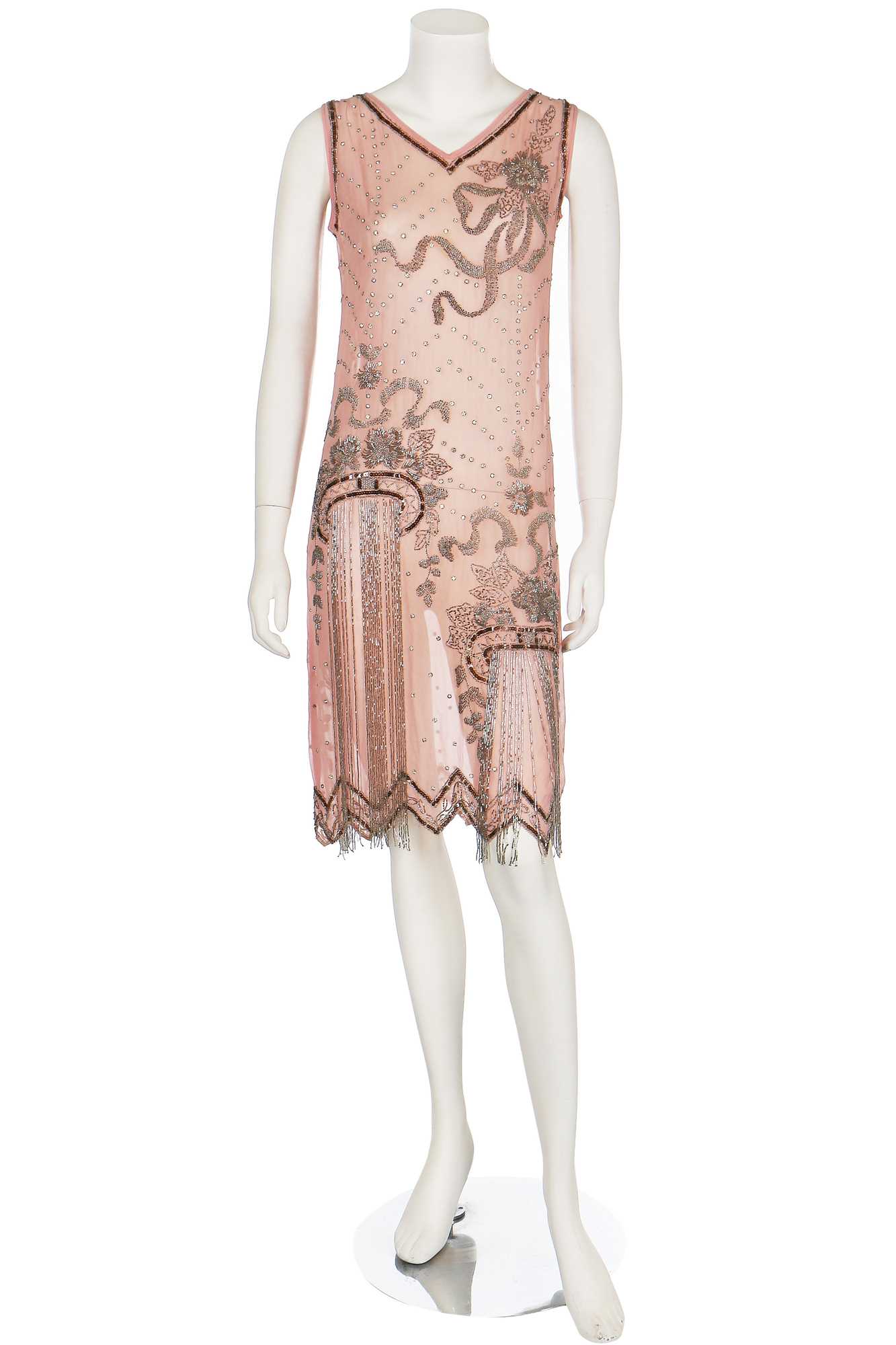Lot 3 - A beaded pale pink crêpe-chiffon flapper dress, mid 1920s