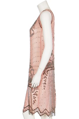 Lot 3 - A beaded pale pink crêpe-chiffon flapper dress, mid 1920s