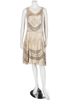 Lot 19 - Two ivory beaded flapper dresses, 1920s