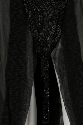Lot 1 - A beaded black chiffon and crêpe evening dress, early 1920s