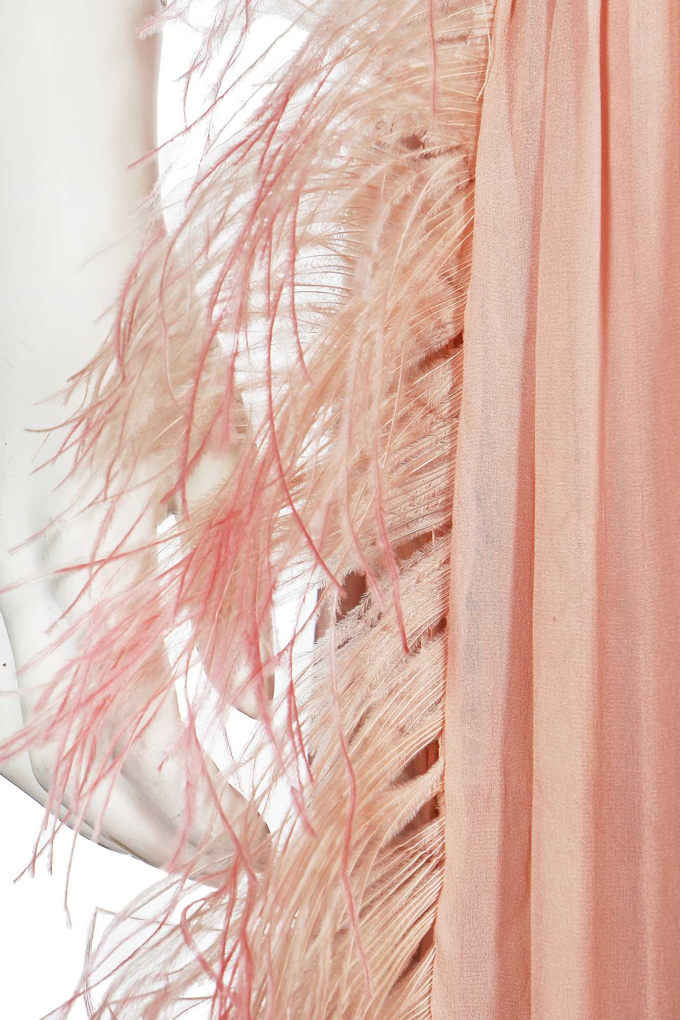 Lot 7 A blue lamé dress with draped swags and