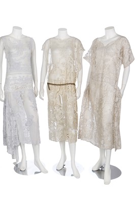 Lot 17 - Ten lace and white-worked summer dresses, 1920-30s