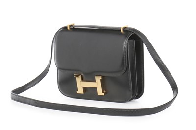 Sold at Auction: An Hermès black box leather Constance bag with gold plated  brass hardware