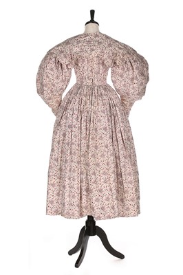 Lot 88 - A printed cotton day dress and matching fichu,...
