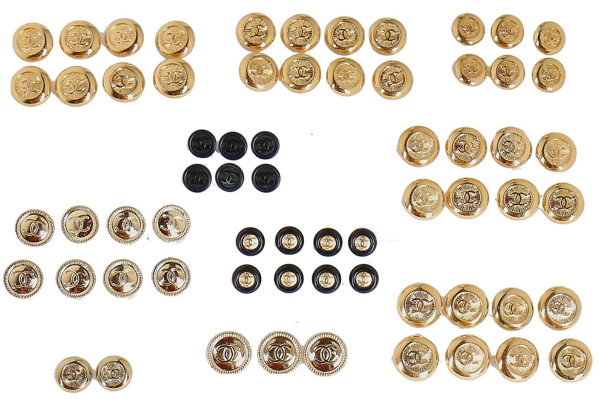 Lot 232 - Sixty-five Chanel buttons, mainly 1992-97,