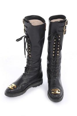 Lot 7 - A rare pair of Chanel leather 'combat' boots,...