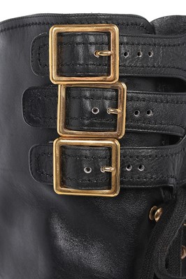 Lot 7 - A rare pair of Chanel leather 'combat' boots,...