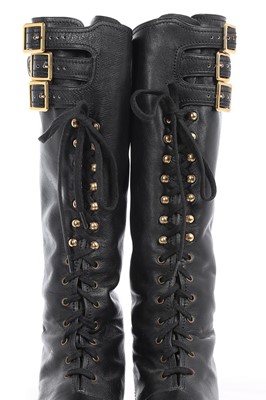 Lot 7 - A rare pair of Chanel leather 'combat' boots,...