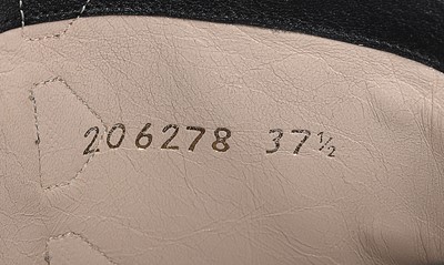 Lot 7 - A rare pair of Chanel leather 'combat' boots,...