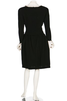 Lot 182 - A Chanel couture black wool suit, circa 1988