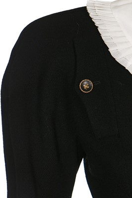 Lot 182 - A Chanel couture black wool suit, circa 1988